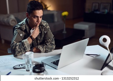 Sad Army Soldier Having Video Chat With His Family And Sending Them A Kiss. 