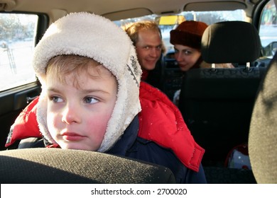 Sad Boy In Winter Family Car