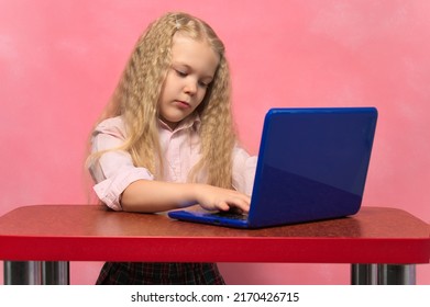 Sad, Brooding Schoolgirl Behind The Lepton. Pink Background