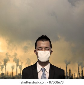 Sad Businessman With  Mask And Air Pollution Concept