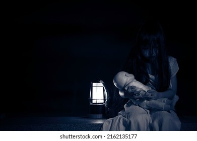 Sad Child Ghost At Night,Halloween  Festival Concept,Friday 13th,Horror Movie Scene,A Girl With Doll