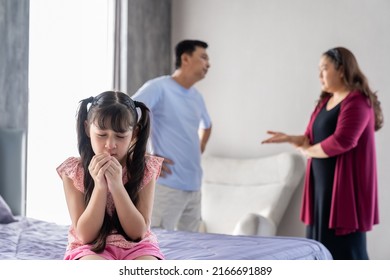 Sad Child Girl Crying With Wet Eyes From Tears From Father And Mother Arguing Then Feels Depressed And Lonely. Little Girl Crying About Parents Arguing. Family Negative, Quarrels Concept.