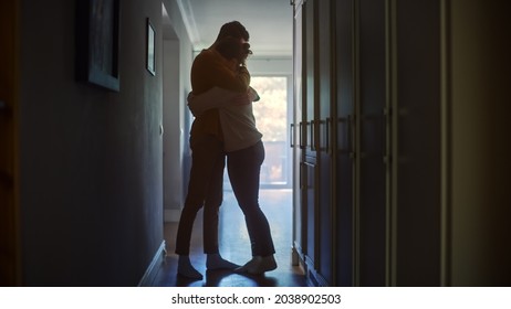 Sad Couple Embracing, Comforting Each other in Difficult Times. Family Overcoming Difficulties Together, Tender Moment. Atmosphere of Sadness and Tragedy. Moment of Human Drama