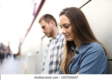 Sad Couple Or Friends Complaining Ignoring Each Other In The Street