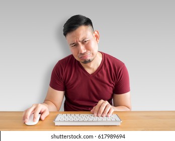 Sad And Crying Face Of Asian Man Who Failed His Work.