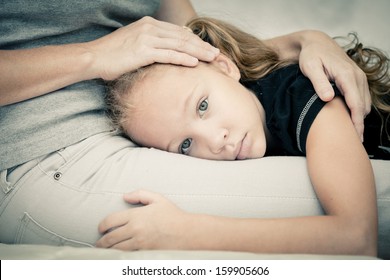 Sad Daughter Hugging His Mother