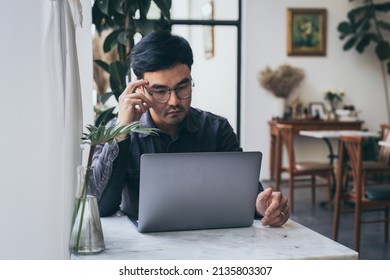 Sad Depression Serious People From Work,study Stress Problem.asian Man Feeling Tired Suffering Using Computer Working Work Place.concept Global Economic,health Problems