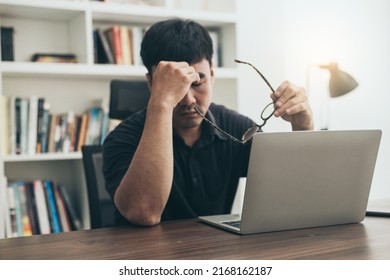 Sad Depression Serious People From Work,study Stress Problem.asian Man Feeling Tired Suffering Using Computer Working Work Place.concept Global Economic,health Problems