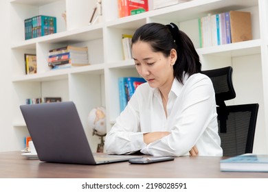 Sad Depression Serious People From Work,study Stress Problem.asian Woman Feeling Tired Suffering Using Computer Working Work Place.concept Global Economic,health Problems