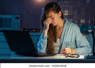Sad exhausted stressed tired woman feeling fatigue, eye strain from late reading book before exam preparation. Sedentary and long work - Shutterstock ID 1410514418