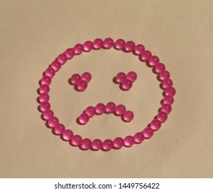 Sad Face Created With Pink Jelly Balls