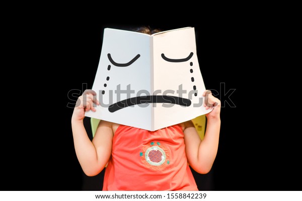 Sad Face On White Book On Stock Photo (edit Now) 1558842239