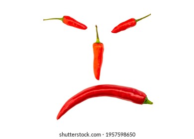 Sad Face Spicy Red Chili Peppers On White Background