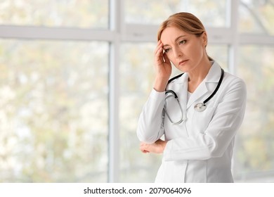 Sad Female Doctor In Clinic