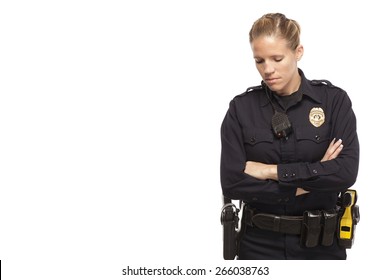 Sad Female Police Officer With Arms Crossed