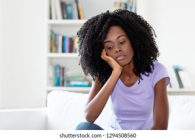 Sad And Frustrated African American Woman Indoors At Home