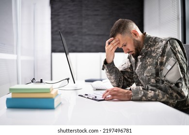 Sad Frustrated Military Veteran Student Doing Test In College