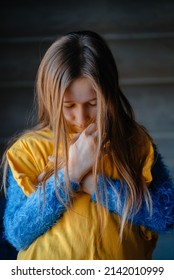 A Sad Girl With Long Hair Lowered Her Head. Sadly . Not Fair.