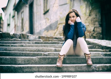 Sad Girl Sitting On A Stairs