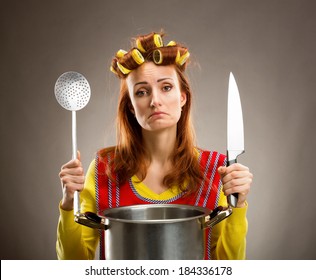 Sad Housewife With Sause Pan