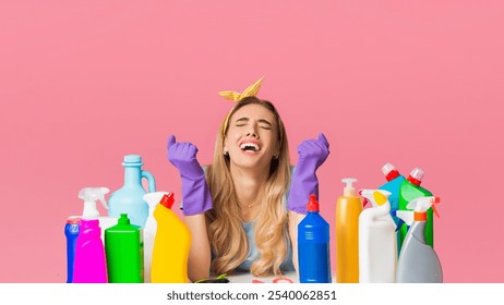 Sad housewife screams from cleaning near cleaning supplies, panorama, free space - Powered by Shutterstock