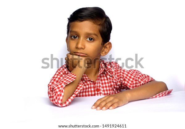 Sad Indian Boy Looking Optimistic During Stock Photo (Edit Now) 1491924611