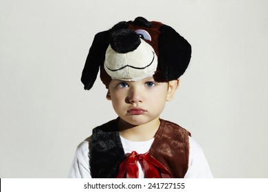 Sad Little Boy In Carnival Dog Costume.Kids.Masquerade.Unusual Uniform.Child.Halloween