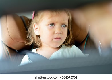 Sad Little Girl In The Car Seat