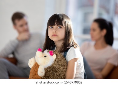 Sad Little Girl Feel Upset Lonely Hug Fluffy Toy Hedgehog Friend Affected By Parent Fight Or Quarrel, Upset Small Child Loner Stressed With Mom And Dad Divorce Or Split, Family Problems Concept