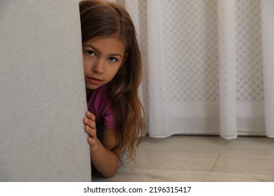 911 Hiding behind sofa Images, Stock Photos & Vectors | Shutterstock