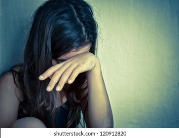 Sad And Lonely Girl Crying With A Hand Covering Her Face (with Space For Text)