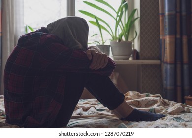 Sad Lonely Teenager Having Trouble And Cry In Bedroom