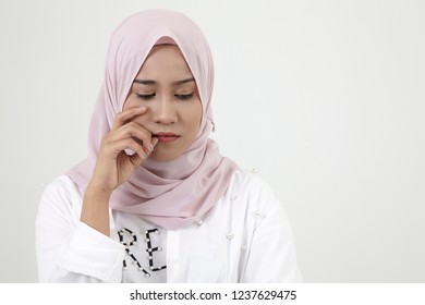 Sad Malay Woman On The White Background