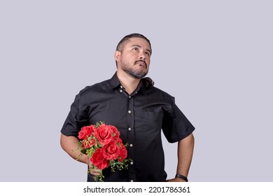 A Sad Man With A Bouquet Of Roses Feeling Disappointed After Being Turned Down Or Rejected By His Love Interest Or Date.