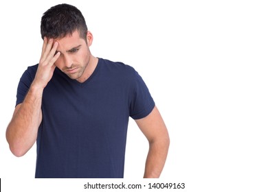 Sad Man Holding His Forehead In White Background