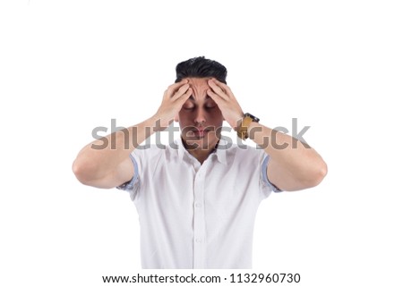 Sad man putting his hand over his forehead, showing tiredness sign, isolated on a white background.