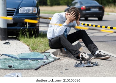 Sad Man At Road Accident Scene, Horizontal