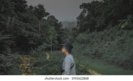 Sad man sits lonely and feels lonely in the middle of nature He's having a lot of distress and needs some encouragement from someone like he's on the verge of depression