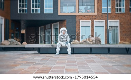 Similar – Image, Stock Photo L. in the streets