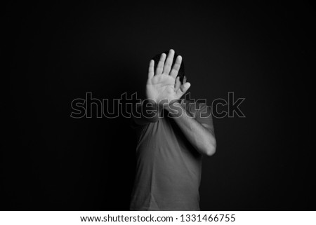 Similar – depressed man closes his eyes with his hands