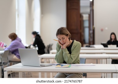 Sad Middle-aged Female Student Trying To Concentrate On Doing Homework, Getting New Qualification, Gaining New Skills In Middle Age, Mature Woman Adult Learner Feeling Bored And Tired Of Online Study