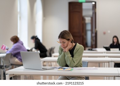 Sad Middle-aged Female Student Trying To Concentrate On Doing Homework, Getting New Qualification, Gaining New Skills In Middle Age, Mature Woman Adult Learner Feeling Bored And Tired Of Online