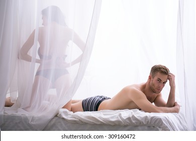 Sad morning in the bedroom of a young couple