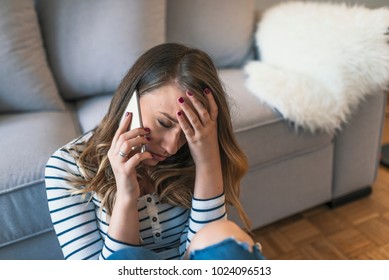  Sad News. Upset Young Woman With Mobile Phone Reads The Message. Closeup Portrait Upset Sad Skeptical Unhappy Serious Woman Talking Texting On Phone Displeased With Conversation