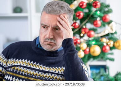 Sad Old Man Feeling Alone During Christmas Celebration