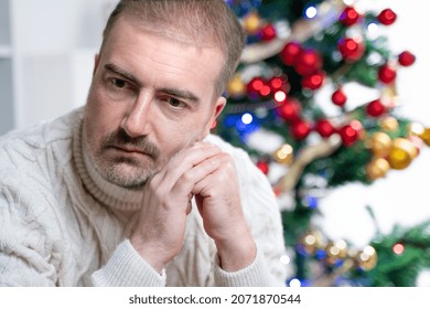 Sad Old Man Feeling Alone During Christmas Celebration