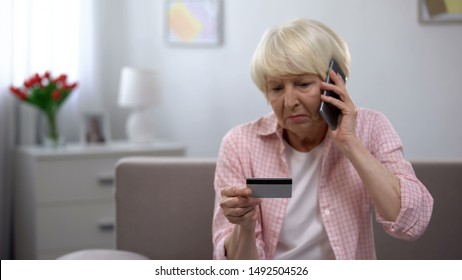 Sad Old Woman With Credit Card Calling Bank Support, Reporting About Money Fraud