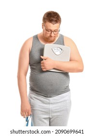 Sad Overweight Man With Scales And Measuring Tape On White Background. Weight Loss Concept