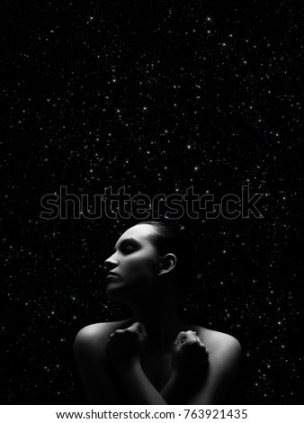 Similar – Young woman in black lingerie in chiaroscuro lighting