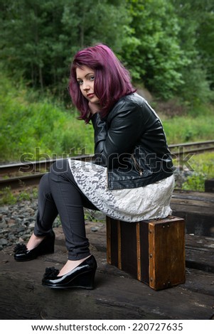 Sad Runaway Teen Girl Waits For Train To Escape Her Problem